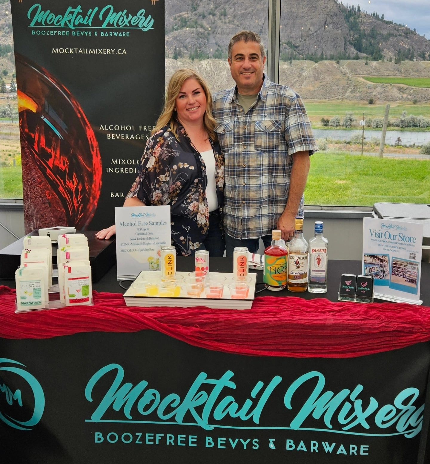 Photo of the owners of Mocktail Mixery at an event in Monte Creek Winery. They offer non-alcoholic options.